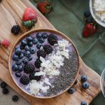 bowl of dehydrated berry mix with coconut garnish