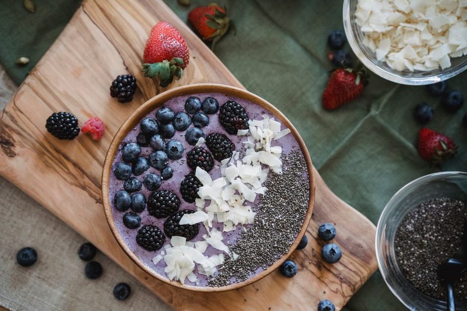 bowl of dehydrated berry mix with coconut garnish