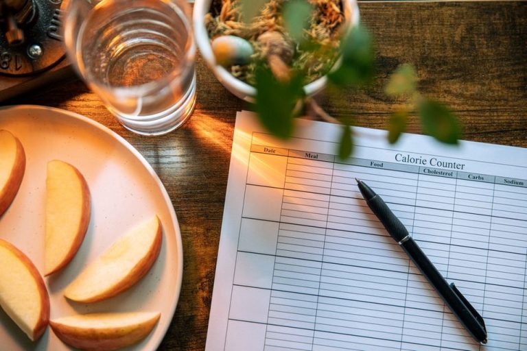 Printed food sensitivity tracker from the 2015 giveaway with columns for meals, symptoms, and lifestyle factors