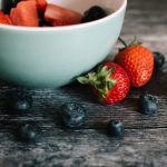 Freshly harvested blueberries on a rustic table