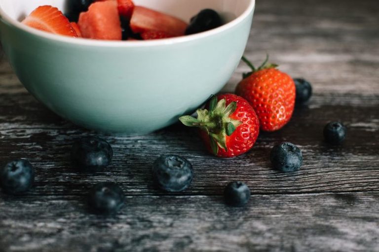 Freshly harvested blueberries on a rustic table
