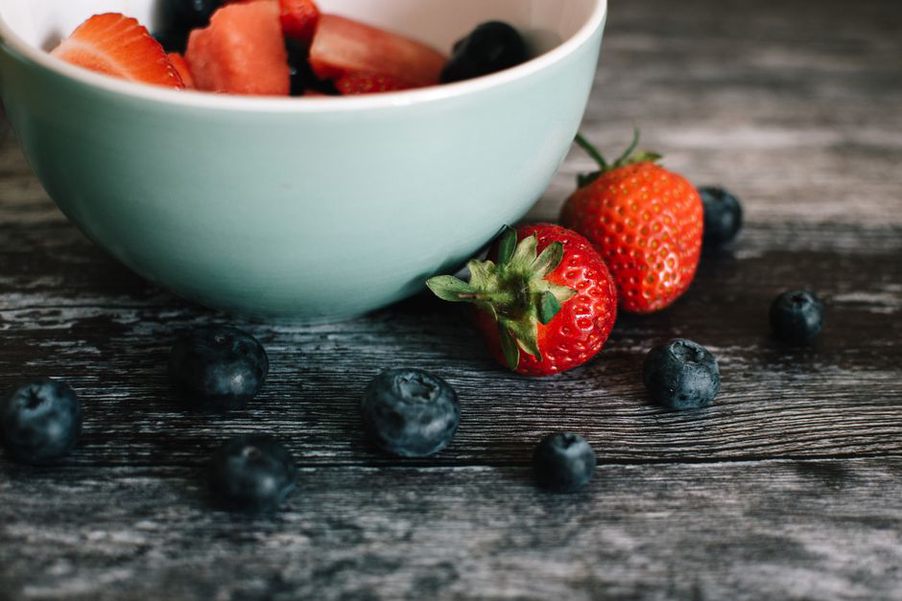 Freshly harvested blueberries on a rustic table