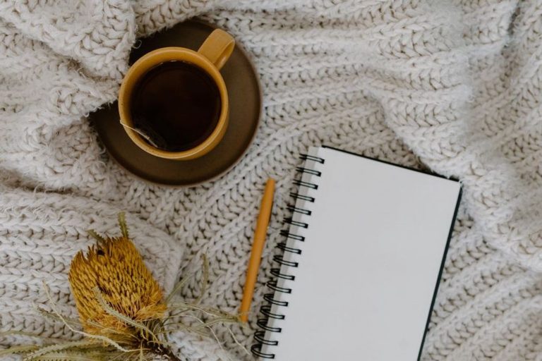 journaling morning routine with tea and pen