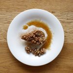Warm pears with cinnamon and a nut topping
