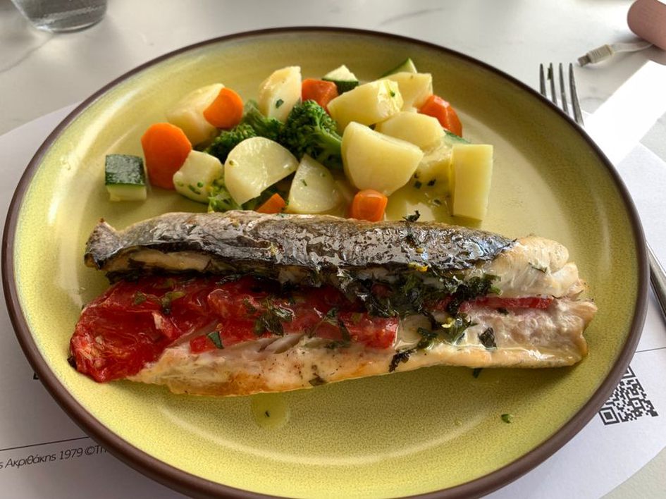 A varied dinner with cooked vegetables and fish