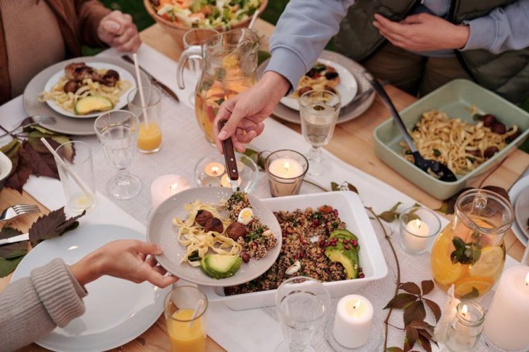 Friends share a meal with different food choices