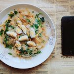 Notes beside a prepared evening meal