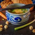 A warm cup of golden homemade broth