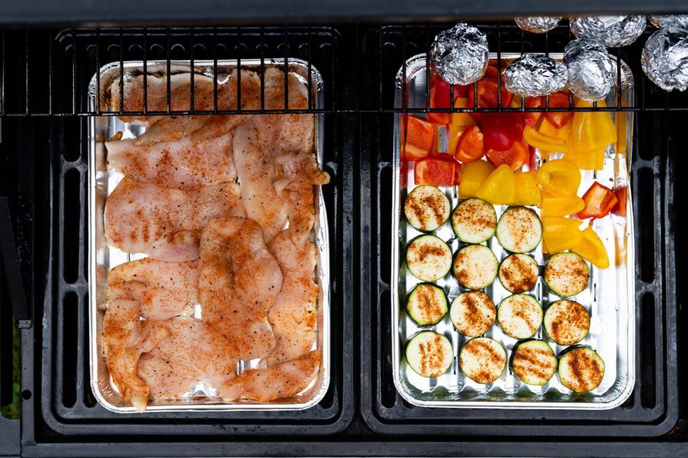 Roasted vegetables and chicken arranged for several meals