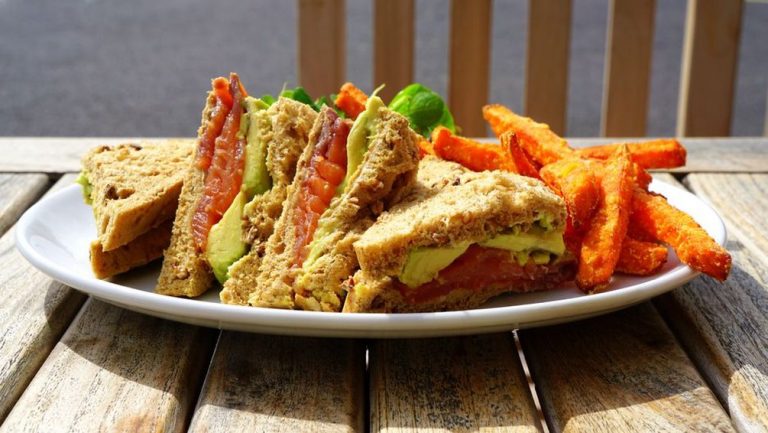 A balanced plate with salmon, vegetables, and sweet potato