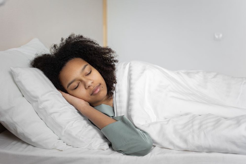 A person enjoying a deep, restful sleep