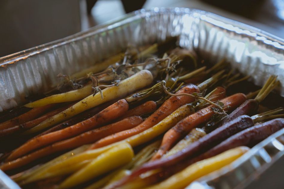 Browned root vegetables cut into even pieces