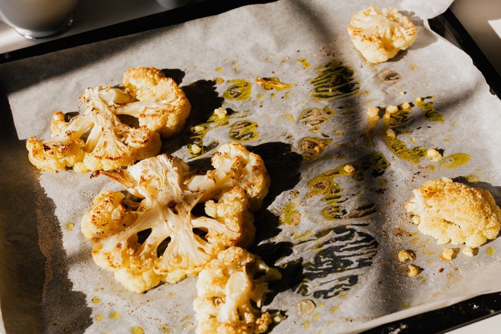 Roasted root vegetables glistening with a light coating of oil