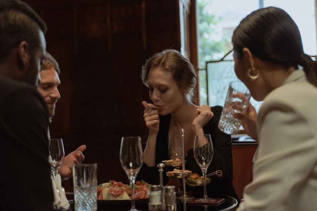 Friends enjoying a mindful meal together