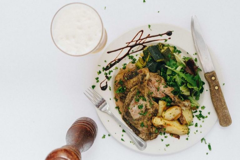 Chicken lunch with potatoes and colorful vegetables