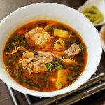 Chicken and vegetables served in a warm bowl