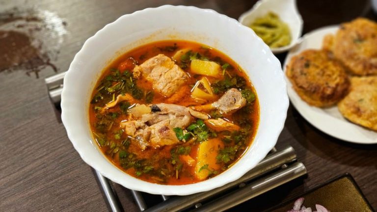 Chicken and vegetables served in a warm bowl