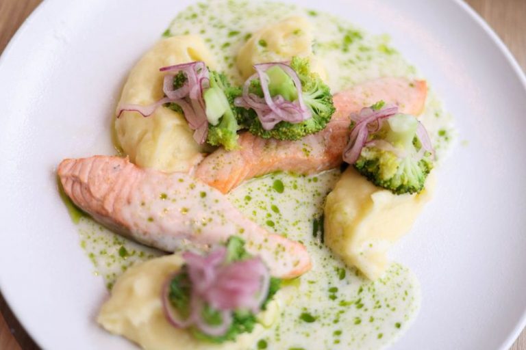 Salmon with sweet potato and cooked greens