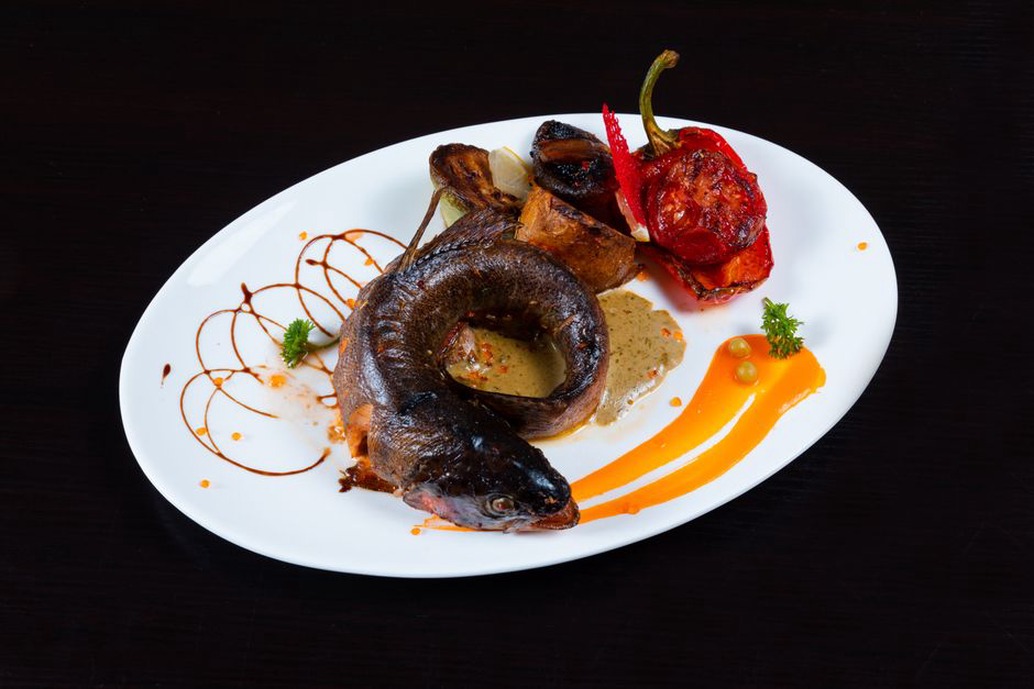 Fish with cooked vegetables and sweet potato