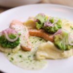 Salmon and cooked vegetables served with sweet potato