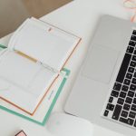 A notebook tracks planned posts and recipe tests