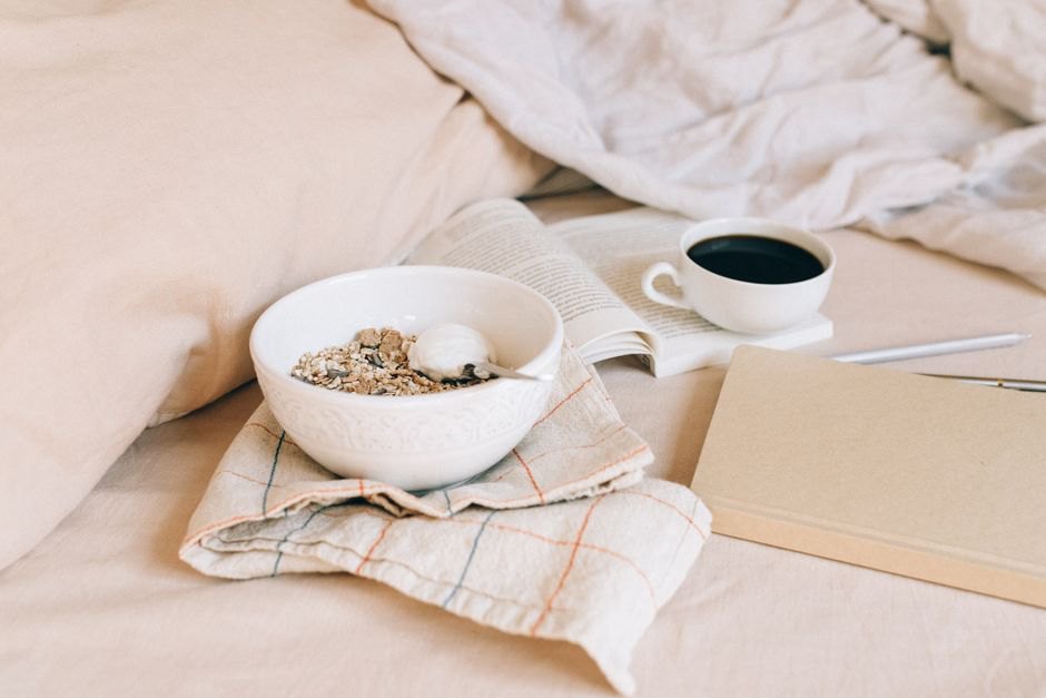 Notebook beside a meal for recording symptom patterns