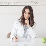 Notes and a calendar beside a meal plan