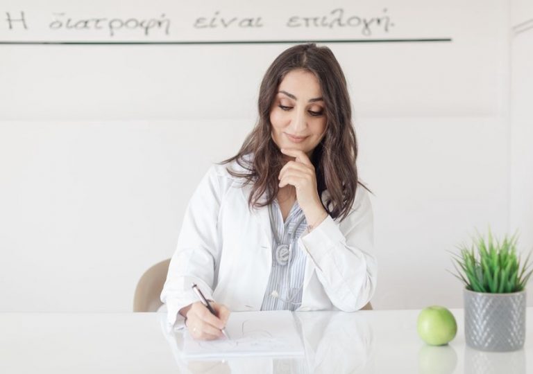 Notes and a calendar beside a meal plan