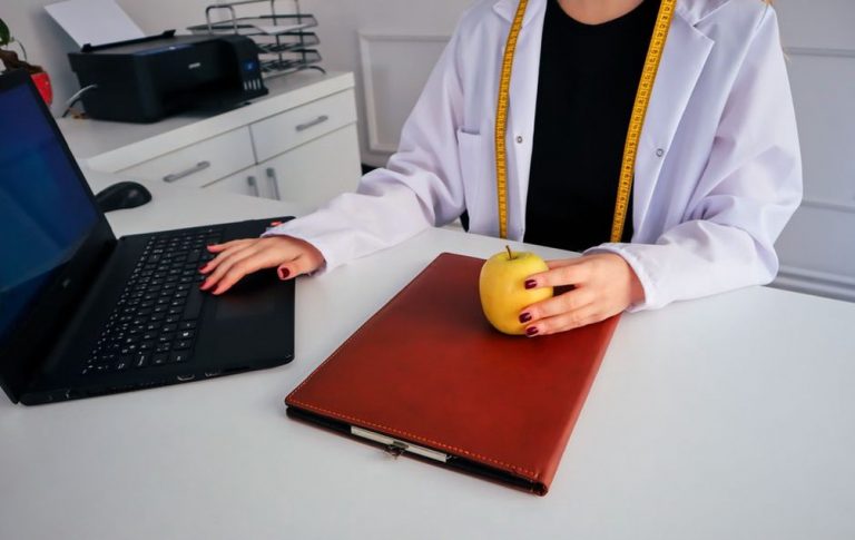 Practitioner reviewing notes before a client session