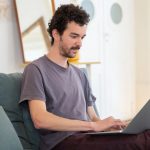 Shopper comparing reviews before buying specialty food