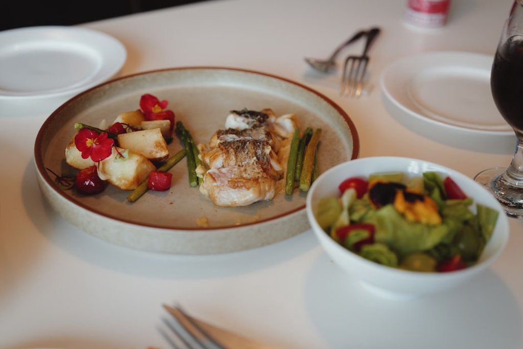Salmon with potatoes and cooked asparagus