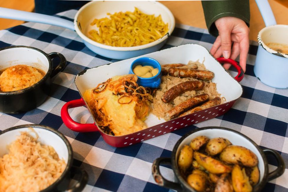 A small portion of sauerkraut beside a meal