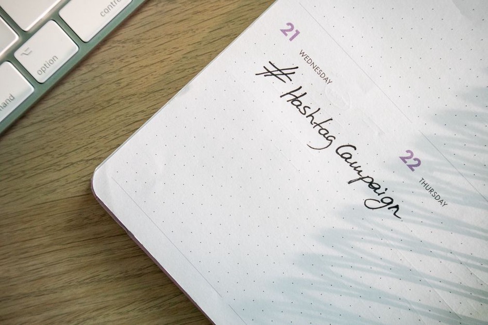 A weekly content plan beside business notes