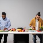 Team preparing a recipe in a working kitchen