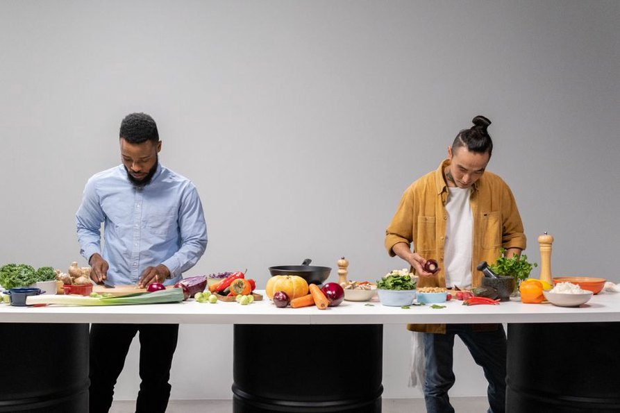 Team preparing a recipe in a working kitchen
