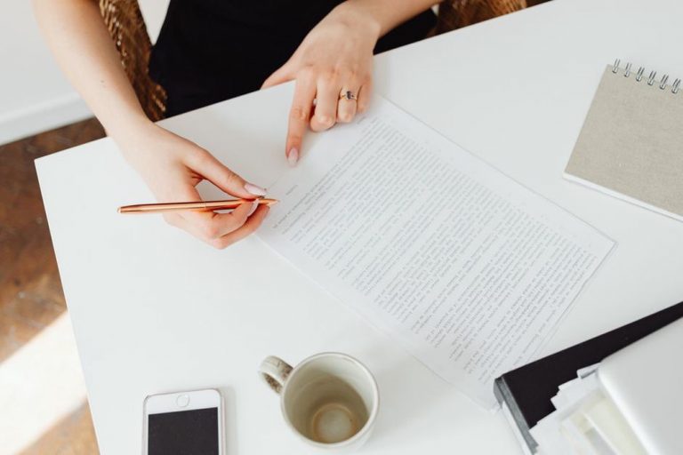 Interview notes beside a draft customer story